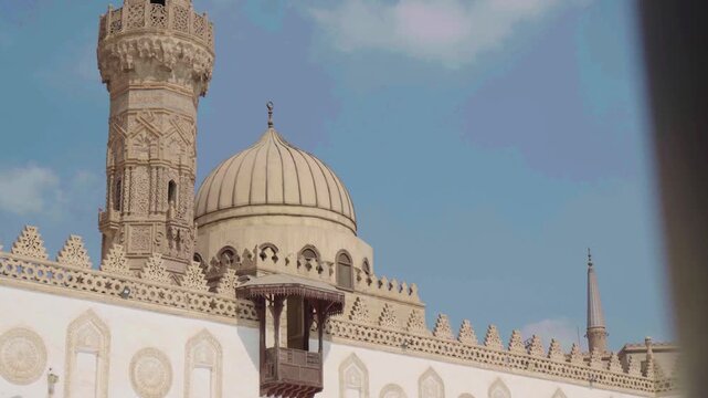 The Great Al Azhar Mosque of Cairo is a historic landmark of Arabic architecture featuring a towering minaret and elegant dome against the Egyptian sky for travelers seeking religious culture
