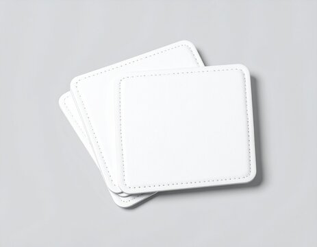 Mockup Of Three Customizable Square Drinks Coasters