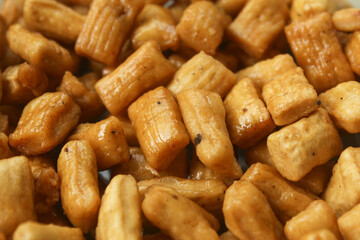 Fototapeta premium traditional Indonesian snacks, crispy and tasty Onion Cake or Ketapang Seeds