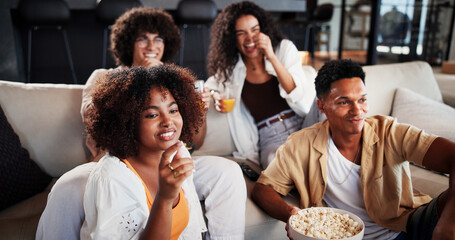 Couple of friends, happy and relax with watching tv on sofa for movie, comedy show or snack in...