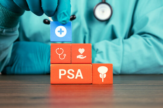 Concept of prostate-specific antigen (PSA) testing, screening, and awareness of early prostate cancer. The urologist's hand arranges wooden cubes with the prostate and bladder icons.