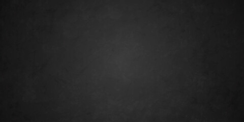 Dark charcoal grunge wall texture background. Dark black rough grunge surface with smoke edge. Black texture chalk board and black board. © MDFAIMIDULISLAM