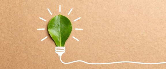 Eco-Friendly Lightbulb Concept with Green Leaf