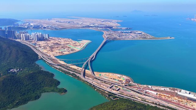 Skyview of lantau island siu ho wan tung chung new town and hong kong zhuhai macau bridge artificial island near chek lap kok airport showcasing greater bay area logistics growth