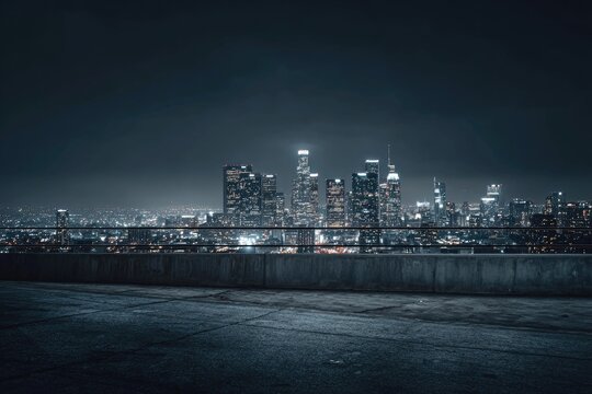 Illuminated cityscape under a dark, moody sky. Rooftop view