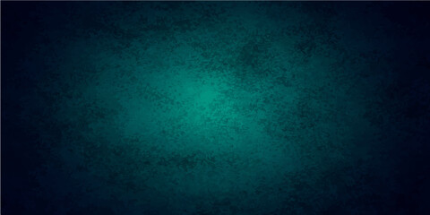 Obraz premium A dark blue grunge background with a textured vintage paper design and aged paint patterns on a rough antique wall backdrop