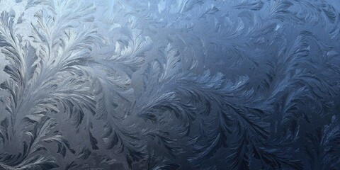 Intricate frost patterns on a blue-tinted surface, resembling delicate ice ferns