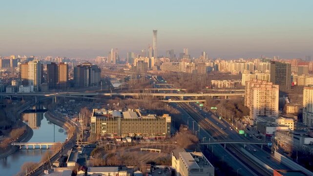 Sunrise Over Beijing CBD Skyline with China Zun Tower and Elevated Expressway