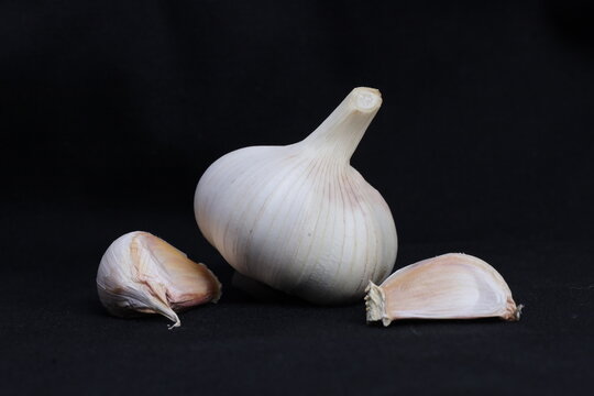 garlic on a black background