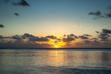 Golden sunset over the ocean in Tikehau, French Polynesia © daboost
