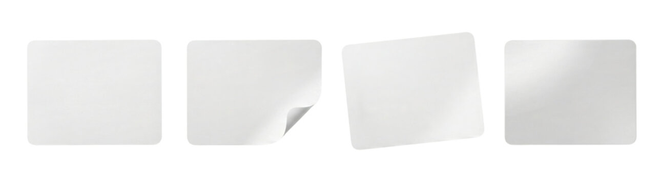 Four blank white square paper notes with rounded corners, one with a curled edge and another slightly tilted, isolated on a transparent background.