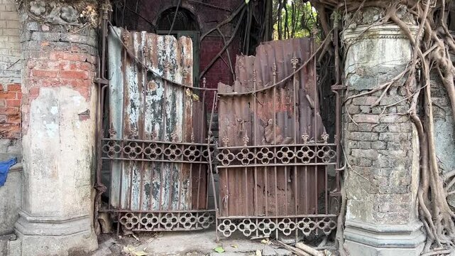 The gates of an old zamindar palace in Bengal