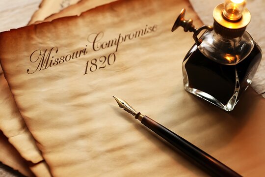 Vintage parchment with Missouri Compromise 1820 text and antique writing tools