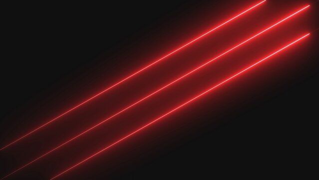 A close-up view of vibrant red laser beams against a dark background
