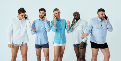 Obraz premium multiethnic men posing for a male edition body positive beauty set. guys with different age, and body wearing boxers underwear and shirt