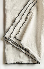 folded crumpled cotton tablecloth