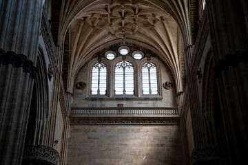 Obraz premium Gothic architecture with intricate ceiling and windows.. Interior of the Cathedral of Salamanca, Spain