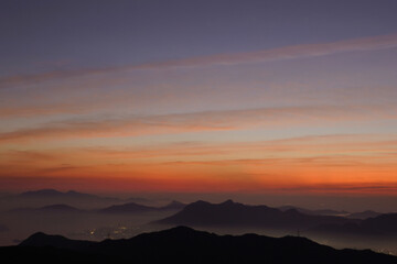 Obraz premium Sunrise at Tai Mo Shan mountain top, Hong Kong