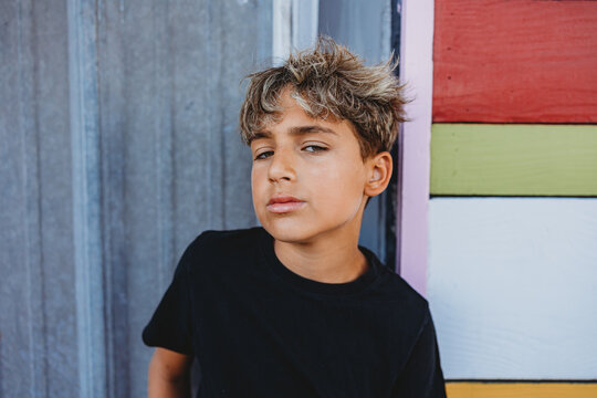 Boy staring at he camera with an attitude