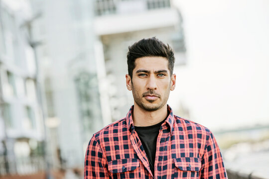 Portrait of young man with stubble