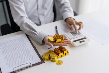 Gold bar Trading business people hand offering gold&nbsp;Investment in gold mining company or Trading gold on the stock exchange&nbsp;Rising prices.