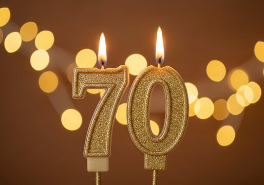 Happy 70th Birthday! Golden Glitter Candles Celebrate a Milestone Anniversary with Bokeh Lights
