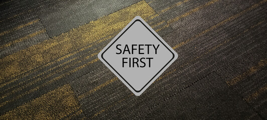 Safety first symbols, work safety, caution work hazards, danger surveillance, zero accident concept. Wooden cubes with smart grey background. Employees safety awareness at workplace. Safety banner.	

