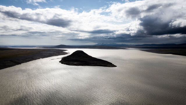 Aerial view of conical landform in H�lsl�n Reservoir Iceland dramatic sky