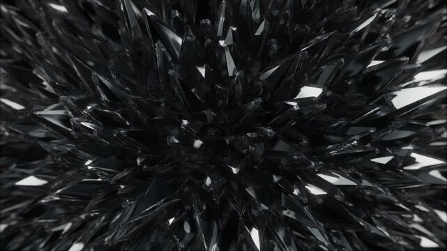 Black crystal shard explosion abstract macro cinematic seamless loop