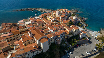 Obraz premium Aerial view of a historic Italian seaside town, with a dense network of ancient houses. It is the historic center of Diamante, in province of Cosenza, Calabria, Italy. It overlooks the Tyrrhenian Sea.