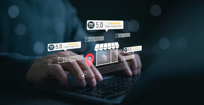 Business owner analyzing online reviews, five star ratings on digital interface with location pin and store icon, representing local SEO, reputation management, customer feedback, online visibility.