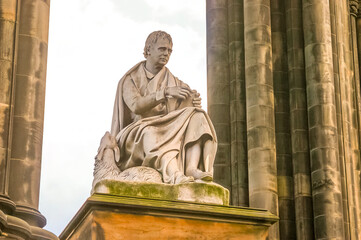 Fototapeta premium The Scott Monument statue in Princes Street Gardens, Edinburgh, Scotland