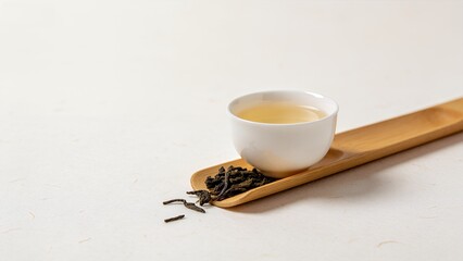 Serene Sip: Artisanal Green Tea in Porcelain Cup with Bamboo Tray