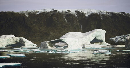 Obraz premium A group of striking ice formations floats in calm waters surrounded by rocky cliffs. The sunlight illuminates the icy textures, showcasing natures beauty in a remote location.