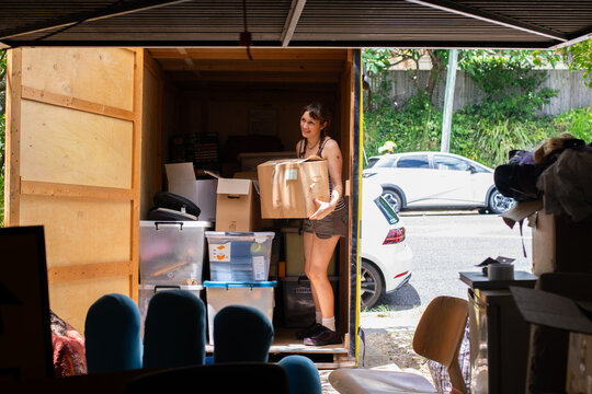 young woman moving house