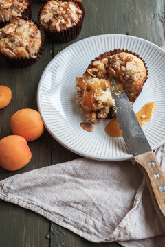 Fresh baked apricot muffin on a plate