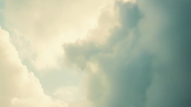 Cloudscape with soft sunlight breaking through layered clouds, creating a serene, ethereal atmosphere that evokes hope, spirituality, and peaceful openness