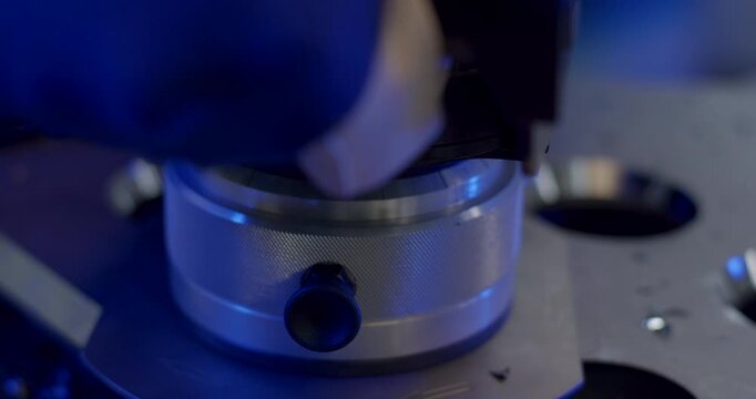 Close-up of industrial CNC milling head or spindle processing metal part