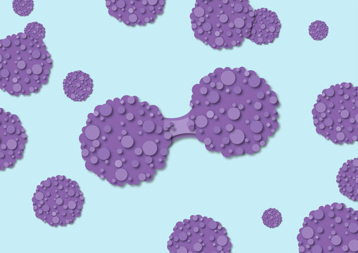 Cancer cells dividing, conceptual illustration