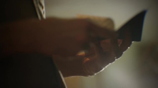 Person who opens drawer and checks bankbook