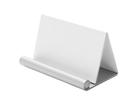 A business card holder with a roll of paper at an office desk