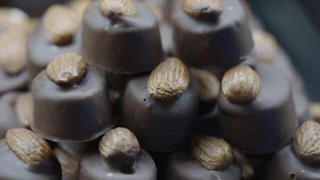Chocolate treats with nuts stacked up for display