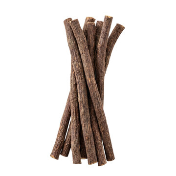 A bundle of dry, dark brown, woody licorice sticks are neatly arranged on a white background