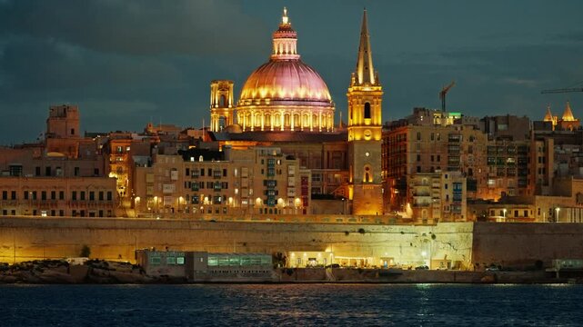 Incredible view of the old town of Valletta at night with incredible illumination and night lights, Malta
