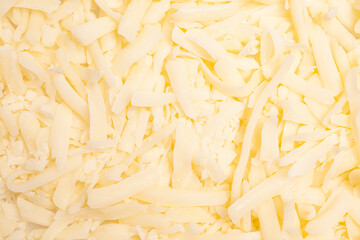 Obraz premium texture of grated cheese close-up
