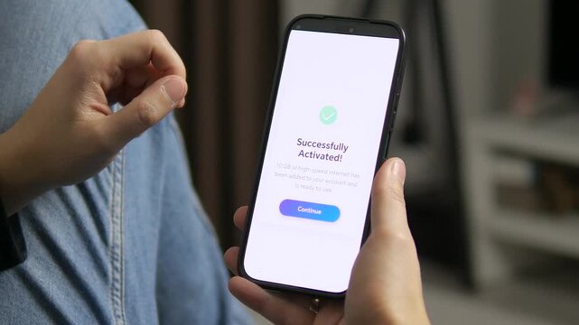 Man activating a 10GB mobile data plan on a smartphone. Fast internet connection setup and digital telecommunication services concept for modern lifestyle.