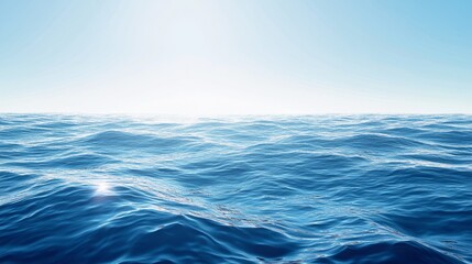 Fototapeta premium Vast ocean horizon under clear blue sky with sunlight reflection