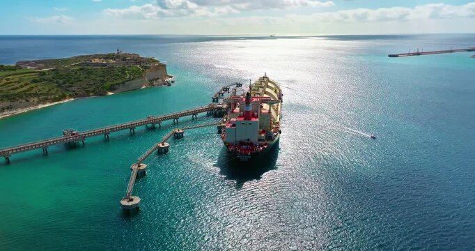 Aerial view of Malta's industrial port at Marsaxlokk. Liquefied natural gas tankers transporting it