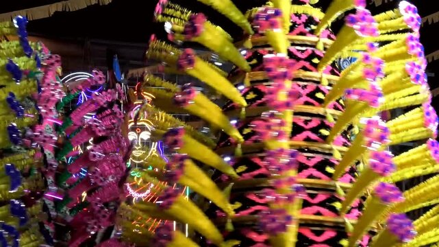 Colorful spinning structures used in the 'Kavadi' procession of temple festivals in Kerala, India