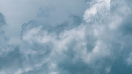 Obraz premium Overcast sky with dark grey and white storm clouds, natural weather background